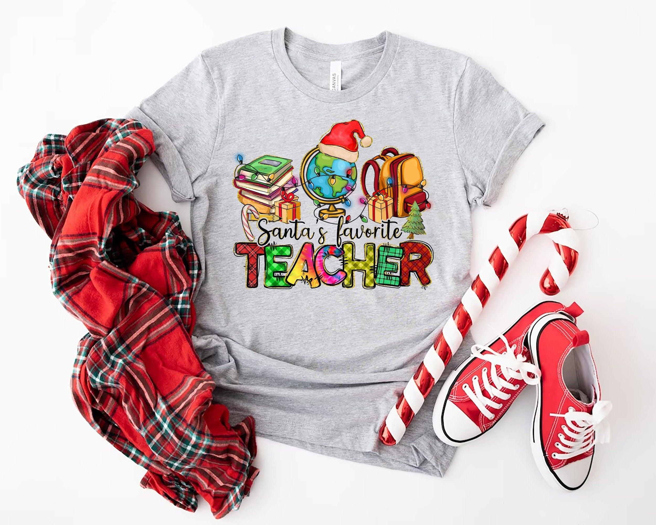 Santa's Favorite Teacher T-Shirt, Teacher Christmas Shirt, Holly Jolly Teacher Tee - Nesta Tees